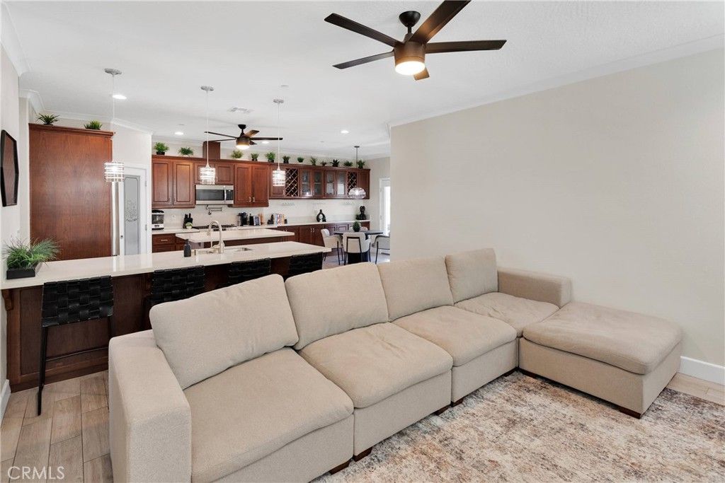 Dining room, Interior, Kitchen, Living room, Pendant Lights, Recessed Lighting, Stainless Steel Appliances, Wood Texture Flooring