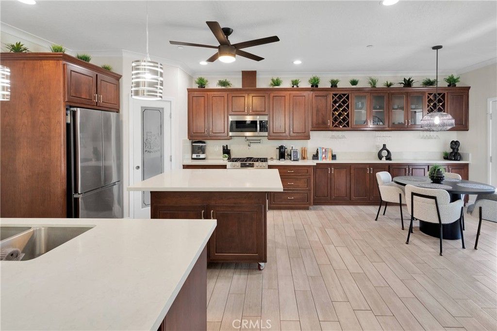 Dining room, Interior, Kitchen, Pendant Lights, Recessed Lighting, Stainless Steel Appliances, Wood Texture Flooring