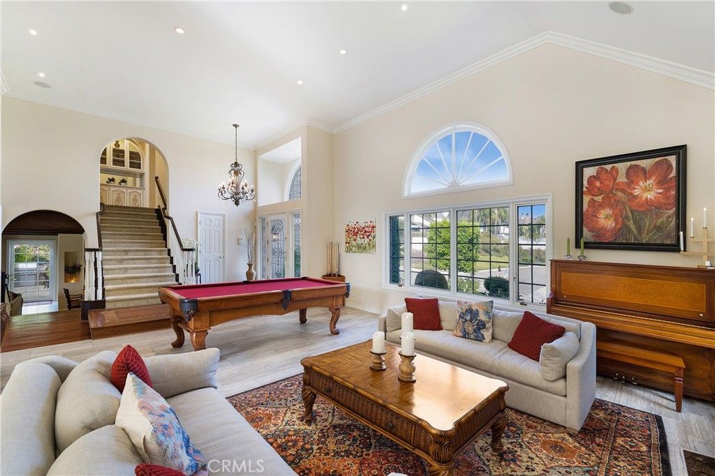Billiard Table, Chandelier, Game Room, Interior, Living room, Piano, Recessed Lighting, Wood Texture Flooring