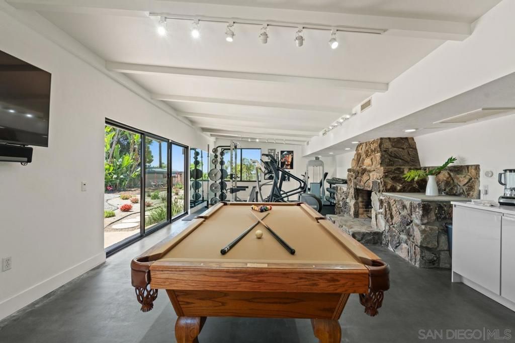 Billiard Table, Fireplace, Fitness Equipment, Game Room, Interior, Stone Walls