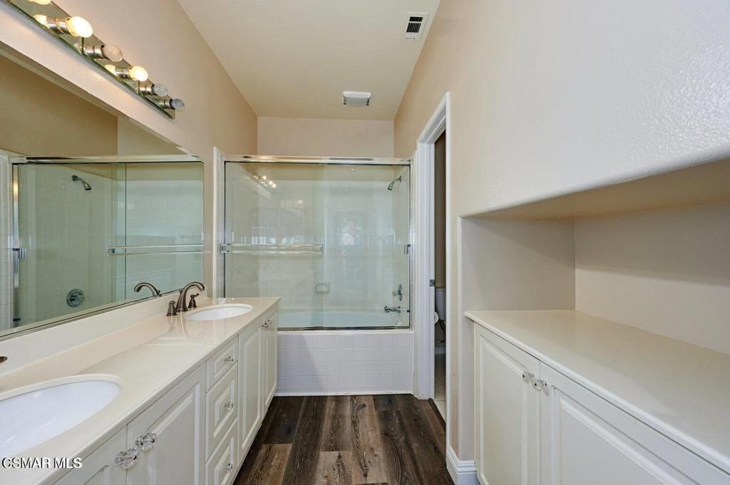 Bathroom, Dual Sink Vanities, Glass Shower, Interior, Wood Texture Flooring