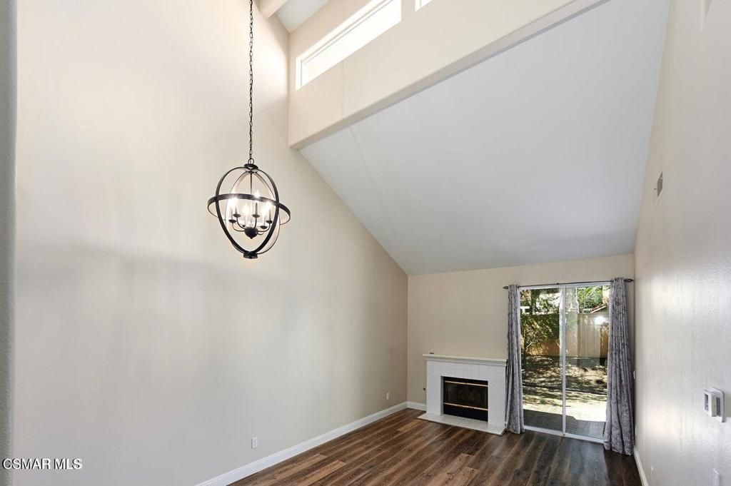 Empty room, Fireplace, Interior, Pendant Lights, Wood Texture Flooring