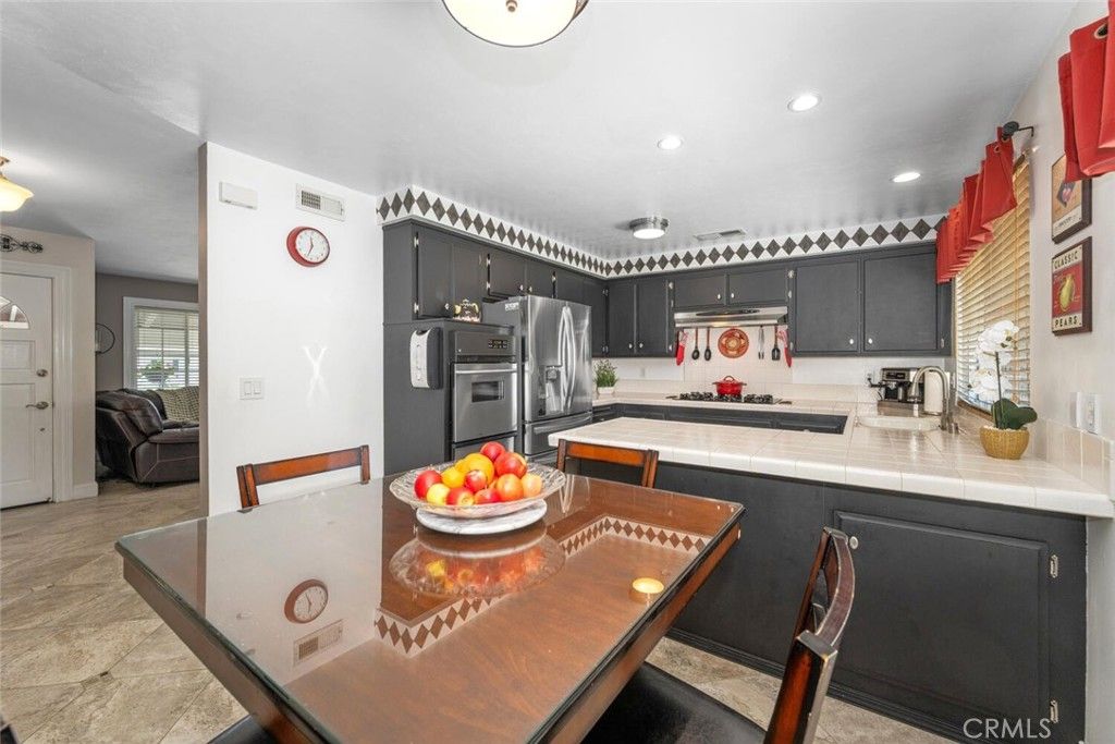 Dining room, Interior, Kitchen, Recessed Lighting, Stainless Steel Appliances, Tile Countertops