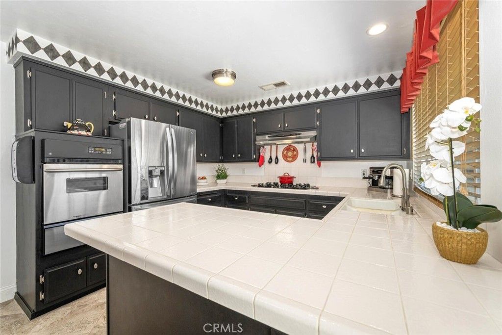 Interior, Kitchen, Recessed Lighting, Stainless Steel Appliances, Tile Countertops