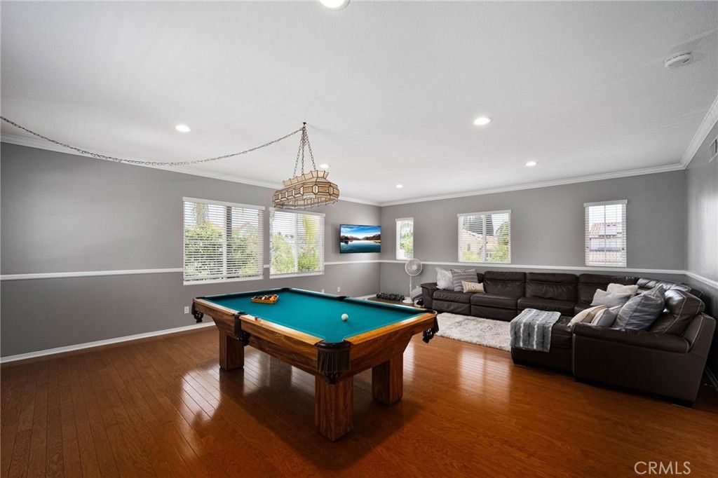Billiard Table, Chandelier, Game Room, Interior, Living room, Recessed Lighting, Wood Texture Flooring