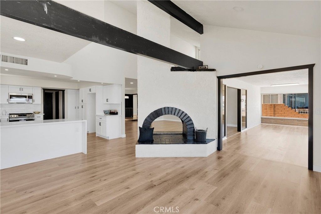 Fireplace, Interior, Kitchen, Recessed Lighting, Wood Texture Flooring