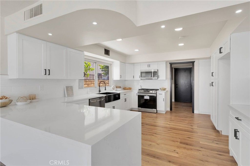 Interior, Kitchen, Recessed Lighting, Stainless Steel Appliances, Wood Texture Flooring