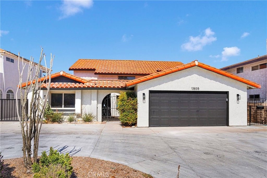 Attached, Exterior, Facade, Spanish Mediterranean