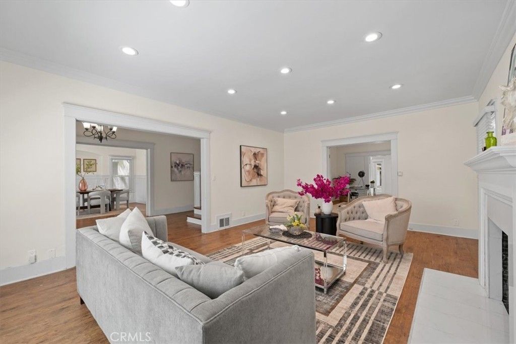 Chandelier, Dining room, Fireplace, Interior, Living room, Recessed Lighting, Wood Texture Flooring