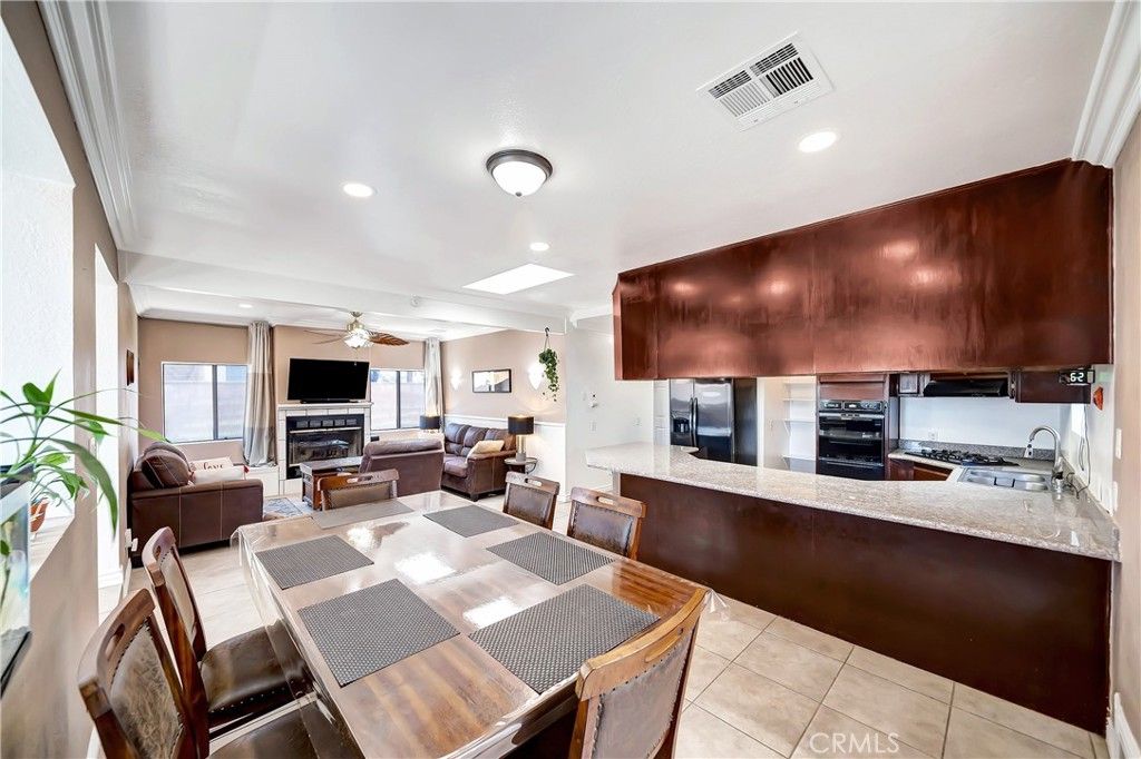 Dining room, Fireplace, Interior, Kitchen, Living room, Recessed Lighting, Stainless Steel Appliances