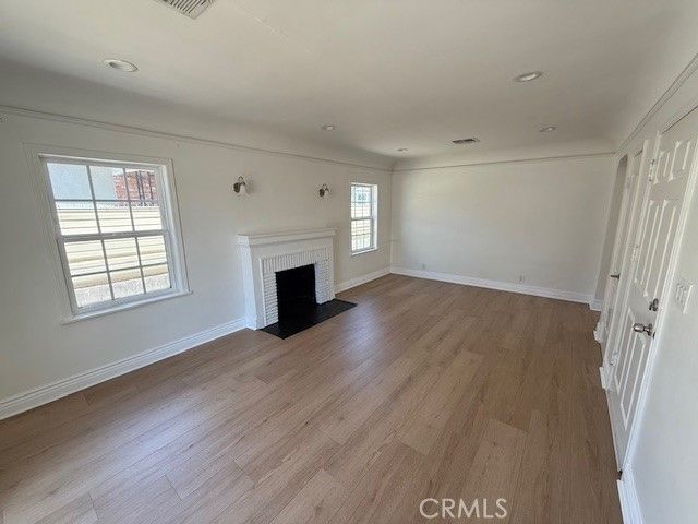 Empty room, Fireplace, Interior, Recessed Lighting, Wood Texture Flooring