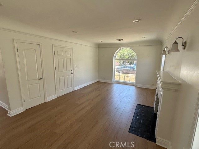 Empty room, Fireplace, Interior, Recessed Lighting, Wood Texture Flooring