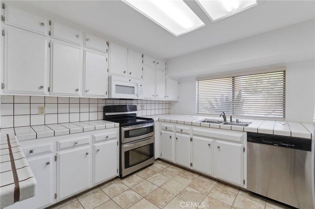 Interior, Kitchen, Stainless Steel Appliances, Tile Countertops