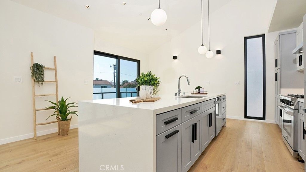 Interior, Kitchen, Pendant Lights, Recessed Lighting, Stainless Steel Appliances, Water, Wood Texture Flooring