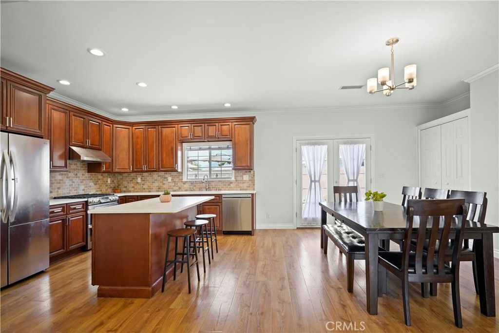 Dining room, Interior, Kitchen, Recessed Lighting, Stainless Steel Appliances, Wood Texture Flooring