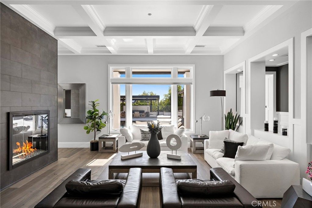 Fireplace, Interior, Living room, Recessed Lighting, Stone Walls, Wood Texture Flooring