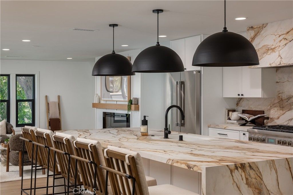 Interior, Kitchen, Marble Walls, Pendant Lights, Recessed Lighting, Stainless Steel Appliances, Wood Texture Flooring