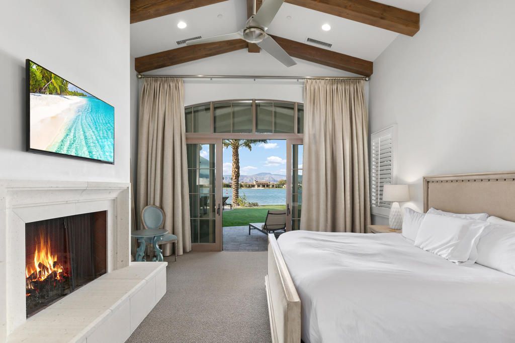 Bedroom, Fireplace, Interior, Recessed Lighting, Water, Wooden Beams