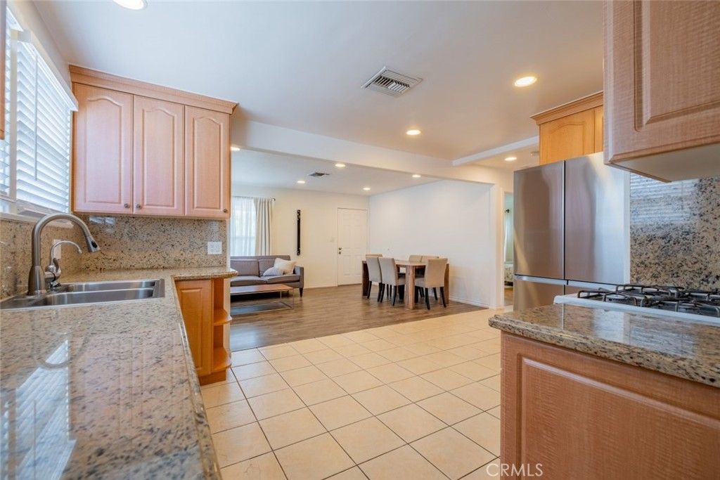 Dining room, Interior, Kitchen, Living room, Recessed Lighting, Stainless Steel Appliances, Wood Texture Flooring