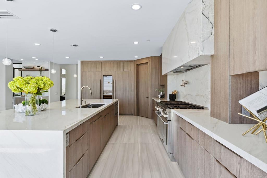 Interior, Kitchen, Marble, Marble Walls, Pendant Lights, Recessed Lighting, Stainless Steel Appliances