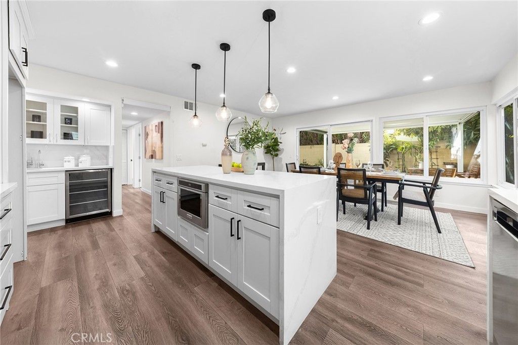Dining room, Interior, Kitchen, Pendant Lights, Recessed Lighting, Stainless Steel Appliances, Wood Texture Flooring