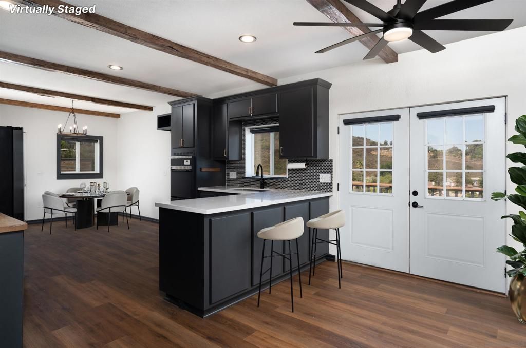 Dining room, Interior, Kitchen, Pendant Lights, Recessed Lighting, Stainless Steel Appliances, Wooden Beams, Wood Texture Flooring