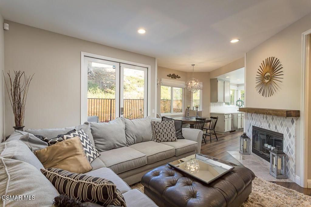 Chandelier, Dining room, Fireplace, Interior, Living room, Recessed Lighting, Wood Texture Flooring
