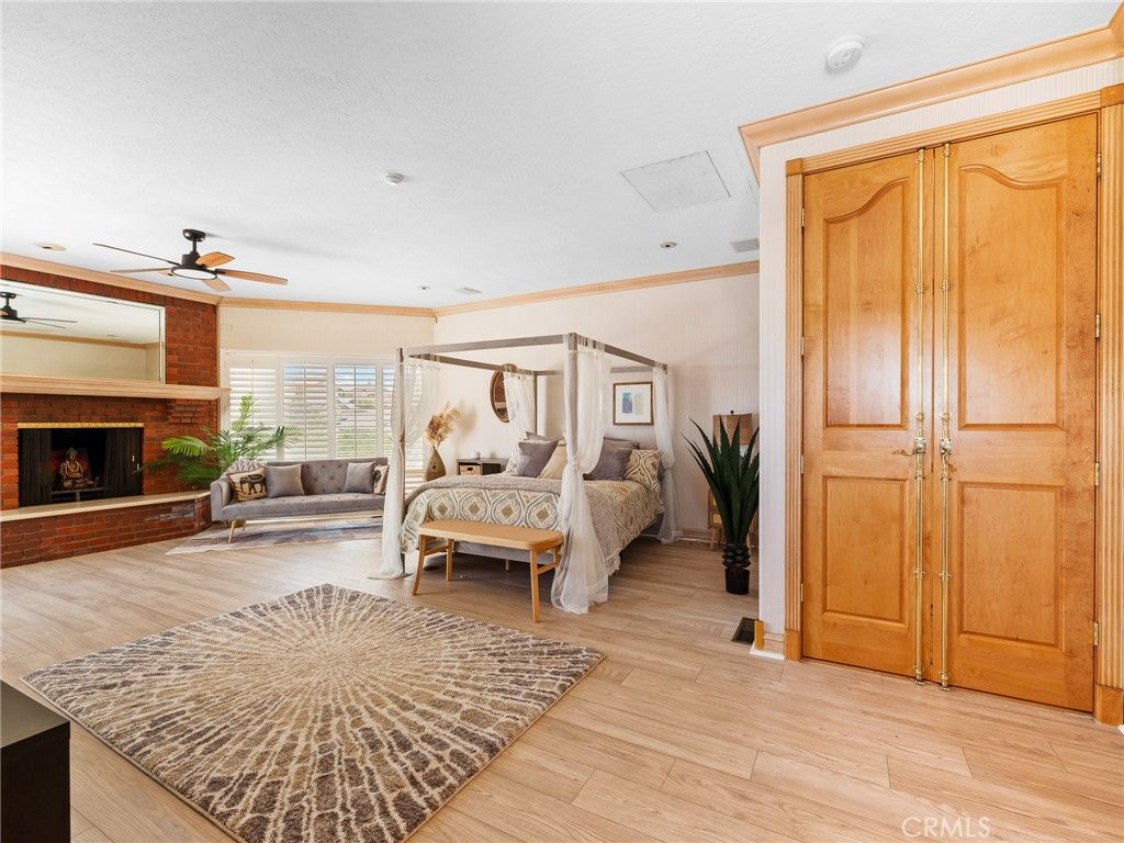 Bedroom, Fireplace, Interior, Living room, Recessed Lighting, Wood Texture Flooring