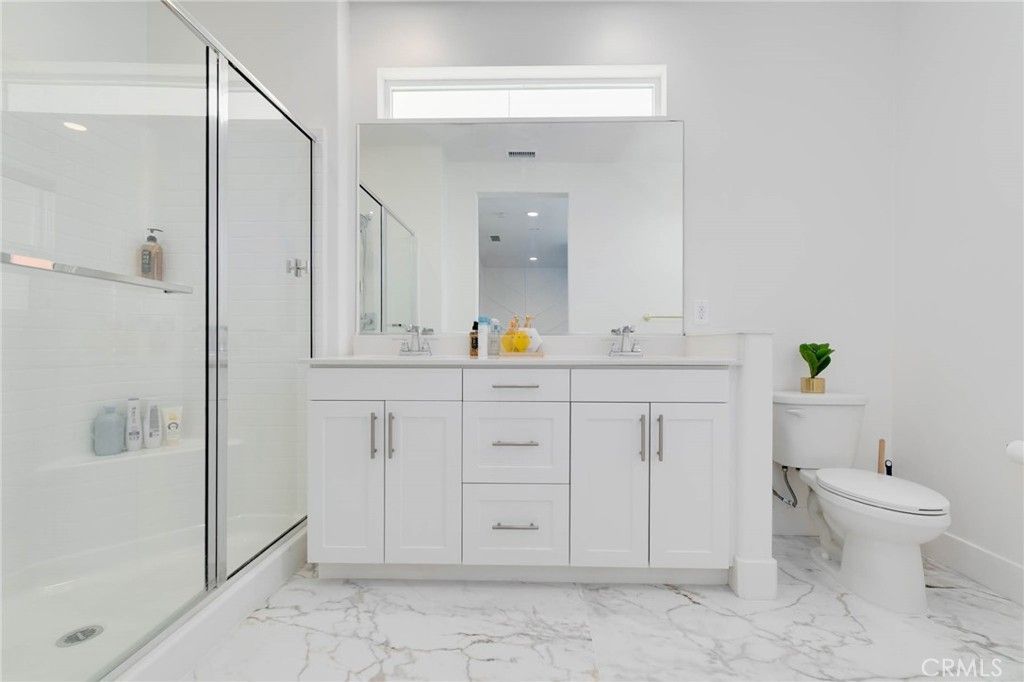Bathroom, Dual Sink Vanities, Glass Shower, Interior, Marble, Recessed Lighting