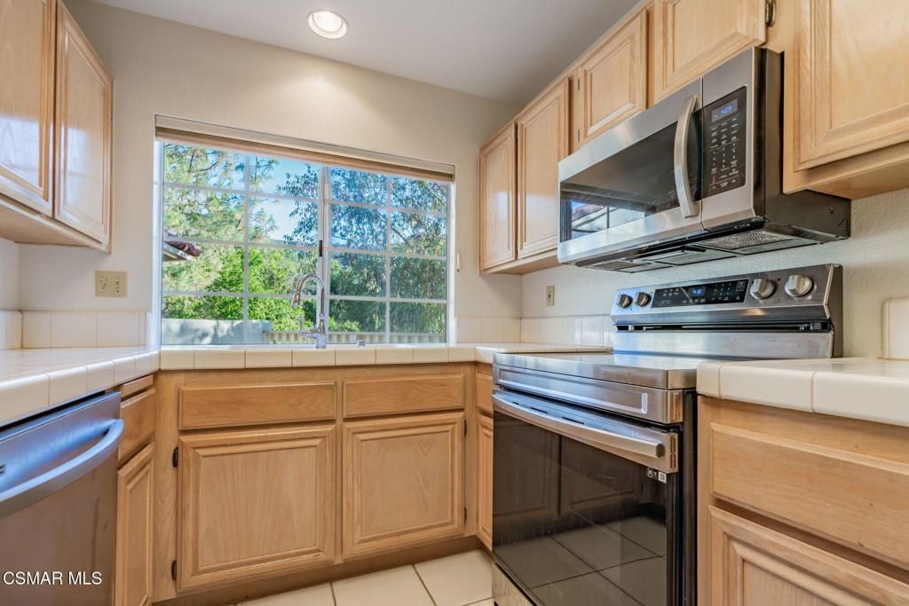 Interior, Kitchen, Recessed Lighting, Stainless Steel Appliances, Tile Countertops