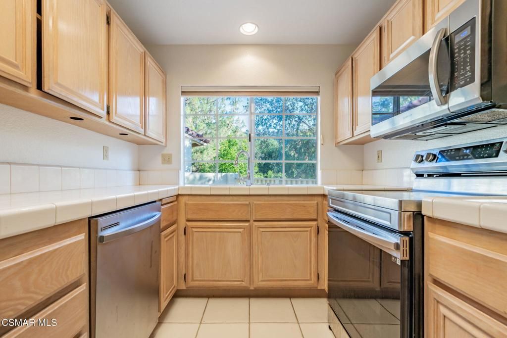Interior, Kitchen, Recessed Lighting, Stainless Steel Appliances, Tile Countertops