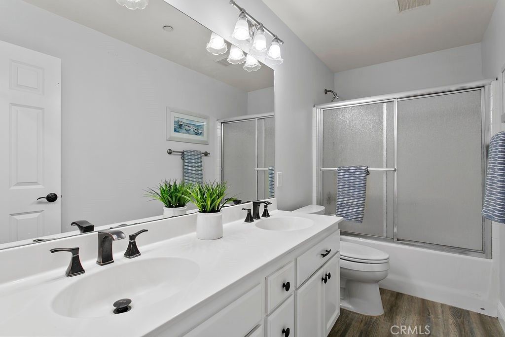 Bathroom, Dual Sink Vanities, Glass Shower, Interior, Wood Texture Flooring