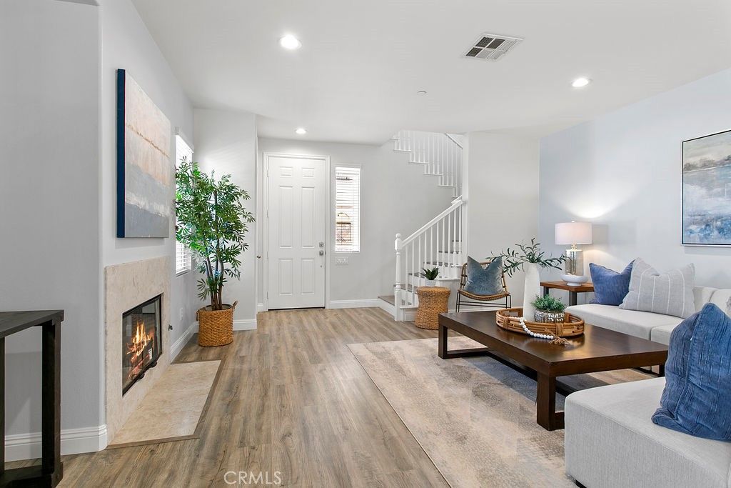 Fireplace, Interior, Living room, Recessed Lighting, Wood Texture Flooring