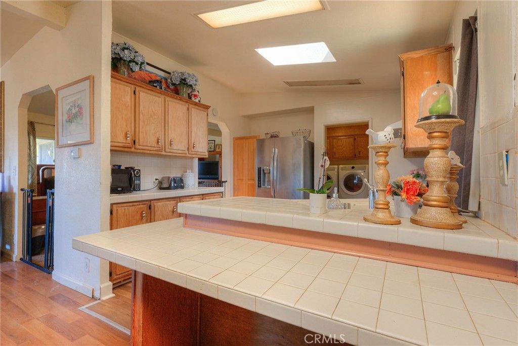Interior, Kitchen, Tile Countertops, Wood Texture Flooring