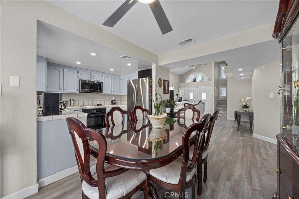 Dining room, Interior, Kitchen, Recessed Lighting, Stainless Steel Appliances, Wood Texture Flooring