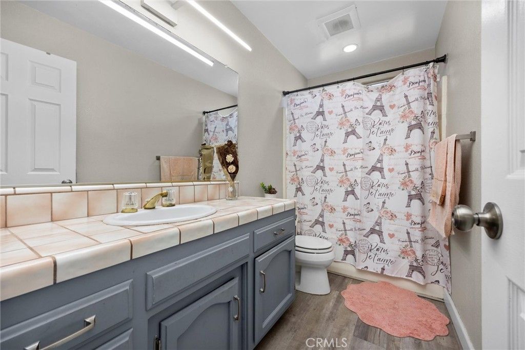 Bathroom, Interior, Recessed Lighting, Tile Countertops, Wood Texture Flooring