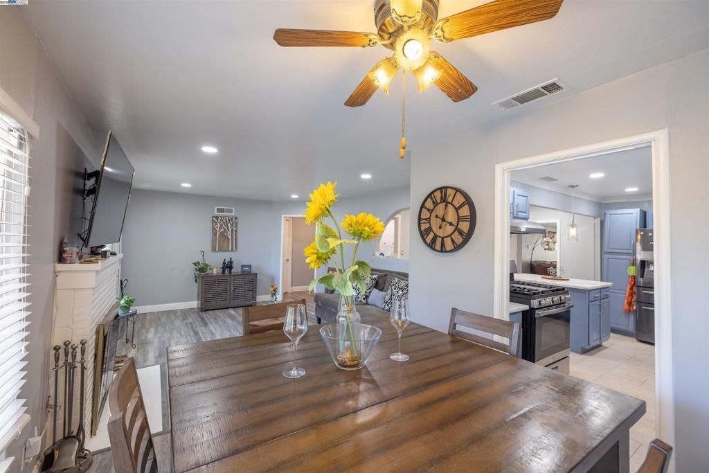 Dining room, Interior, Kitchen, Recessed Lighting, Stainless Steel Appliances, Wood Texture Flooring