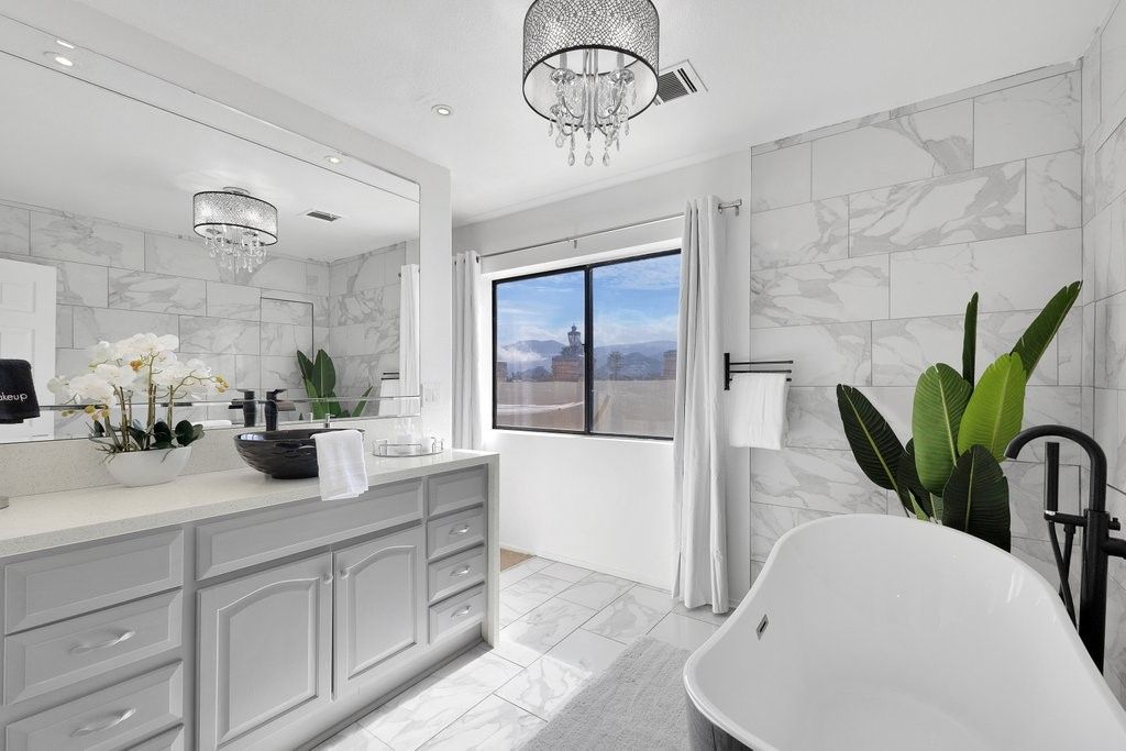 Bathroom, Chandelier, Dual Sink Vanities, Free Standing Baths, Interior, Marble, Marble Walls, Recessed Lighting