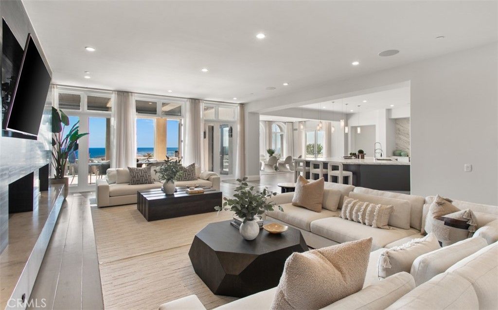 Dining room, Fireplace, Interior, Kitchen, Living room, Pendant Lights, Recessed Lighting, Water, Wood Texture Flooring