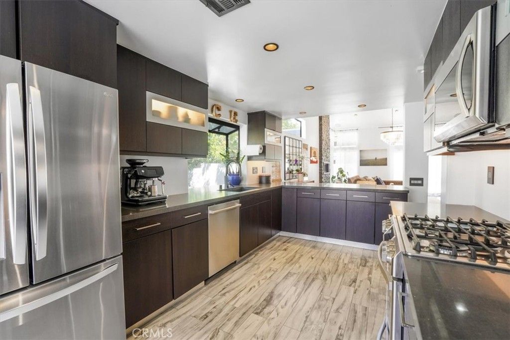 Chandelier, Interior, Kitchen, Recessed Lighting, Stainless Steel Appliances, Wood Texture Flooring