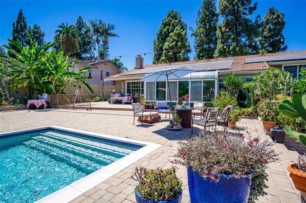 Exterior, Pool, Solar Panels