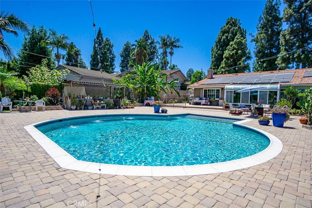 Exterior, Pool, Solar Panels