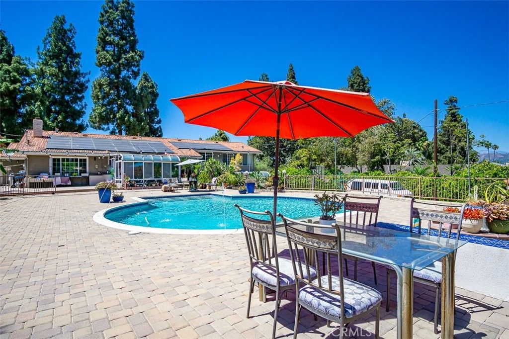 Exterior, Pool, Solar Panels