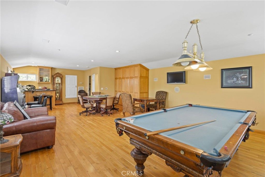 Billiard Table, Dining room, Game Room, Interior, Pendant Lights, Recessed Lighting, Wood Texture Flooring
