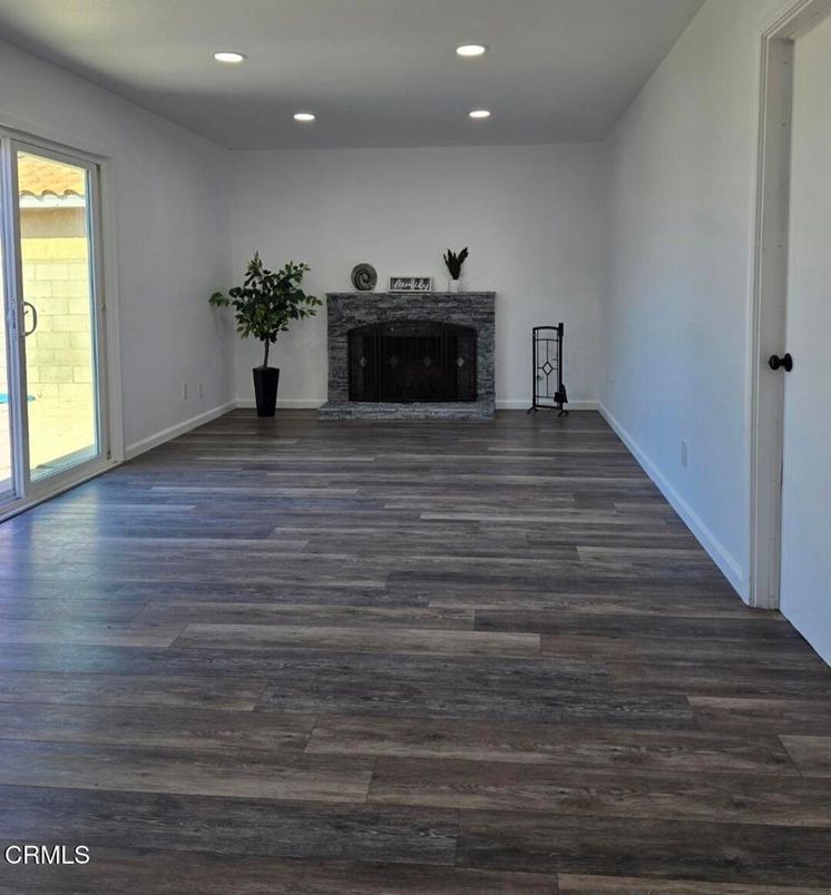 Empty room, Fireplace, Interior, Recessed Lighting, Wood Texture Flooring