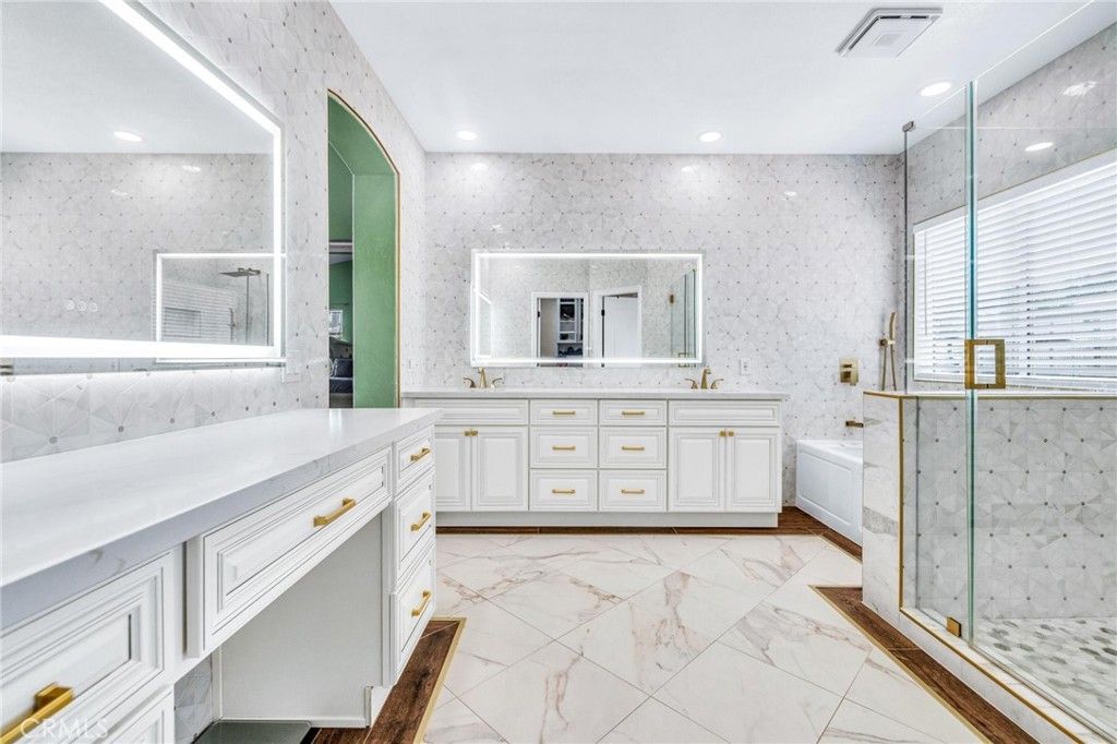 Bathroom, Dual Sink Vanities, Glass Shower, Interior, Marble, Marble Walls, Recessed Lighting