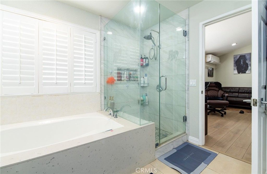 Bathroom, Glass Shower, Interior, Marble Walls, Recessed Lighting, Wood Texture Flooring