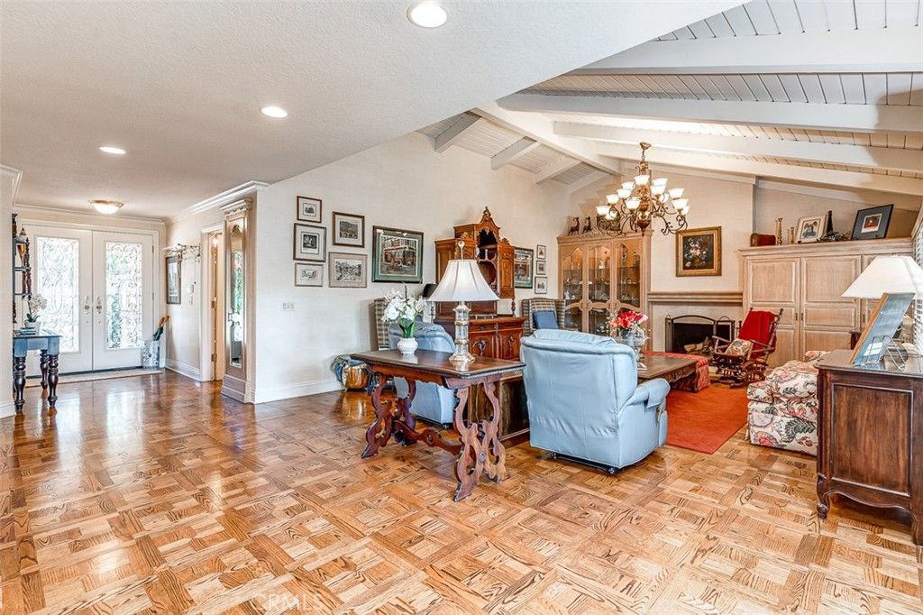 Chandelier, Fireplace, Interior, Living room, Recessed Lighting, Wood Texture Flooring