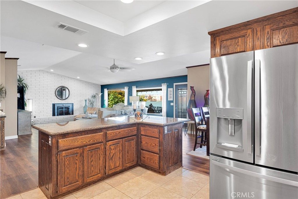 Fireplace, Interior, Kitchen, Recessed Lighting, Stone Walls, Wood Texture Flooring