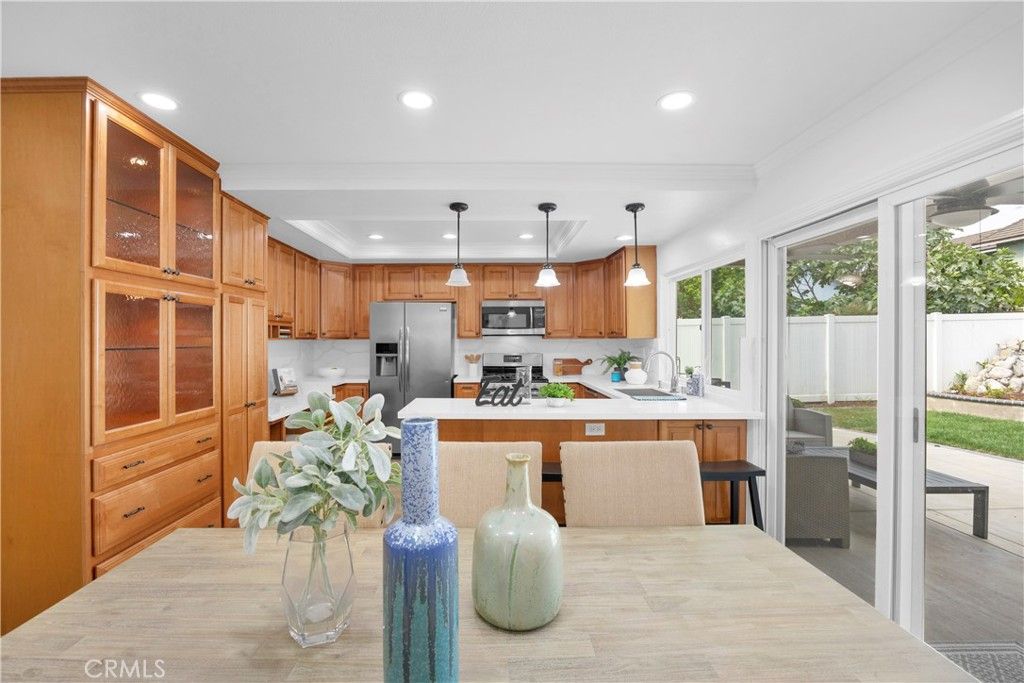 Dining room, Interior, Kitchen, Pendant Lights, Recessed Lighting, Stainless Steel Appliances, Wood Texture Flooring